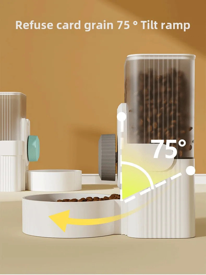 A cat hanging next to a water dispenser, while a dog drinks from a water bowl below. In the background, there is an automatic feeding system, and a rabbit cage with a hanging water bottle. The setup shows various pet supplies for different animals.